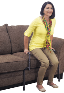 An elderly using a lift aid to stand up