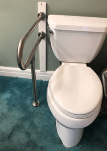Toilet equipped with a fix grab bar
